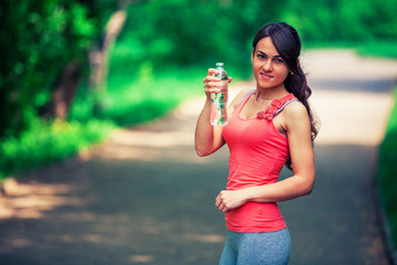 a girl drinks water