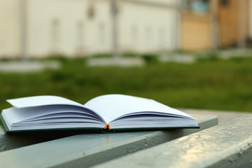 books on a bench in the school year