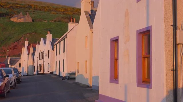 The small Scottish fishing village of Pennan at sunset.