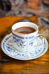 cup of coffee on the wooden table