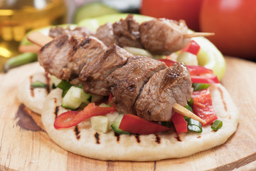Souvlaki or kebab on pita bread