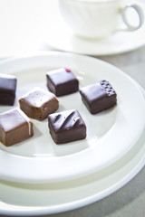 Handmade luxury chocolate on white plate