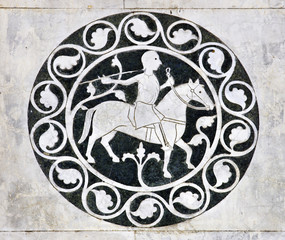 Lucca - detail from St Martin's Cathedral facade. Tuscany