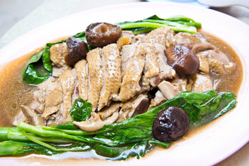 Stewed duck with mushroom and vegetables on plate