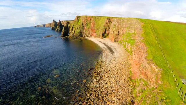 Aerial shot of the beautiful Duncansby Head sea stacks in Northern Scotland.
