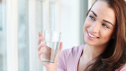 attractive woman drinking water