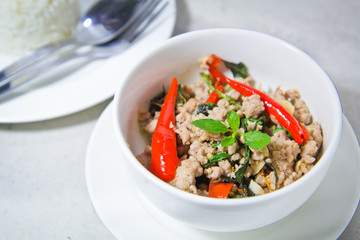spicy pork with hot basil on stream jasmine rice