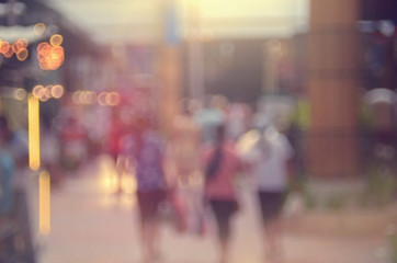 Blur people walking in shopping center mall abstract background.