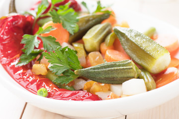 Vegan meal with okra, bell pepper and vegetable