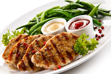 Grilled steaks and vegetables