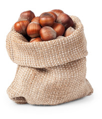 hazelnuts in bag isolated on white