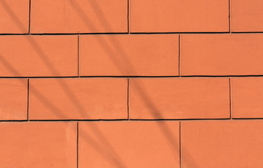 Orange stylized brick wall texture.