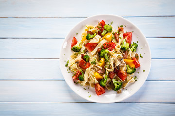 Pasta with sausages and vegetables 