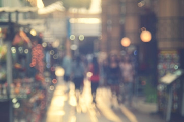 Blur people walking in shopping center mall abstract background.