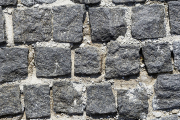 texture strong stone masonry on the track