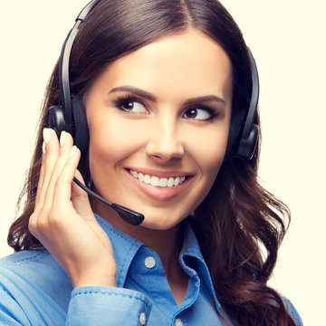 Portrait of happy smiling customer support phone operator