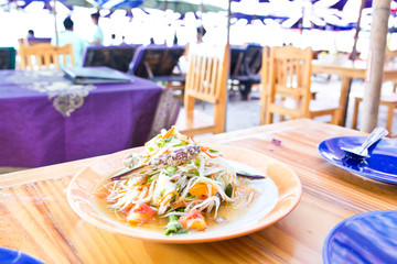 Thai papaya spicy salad on in the the beach restaurant, Som Tum