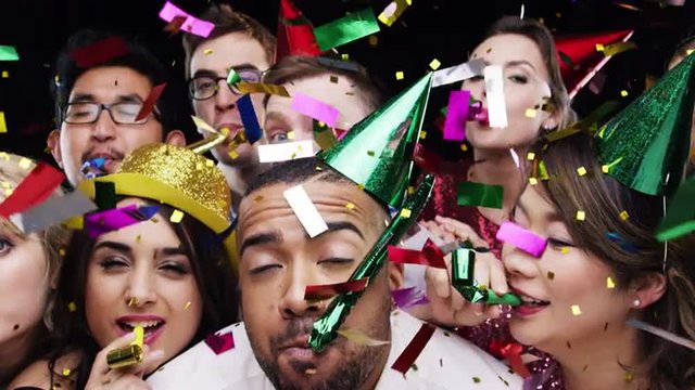 Multi-ethnic group of people celebrating birthday party slow motion photo booth 
