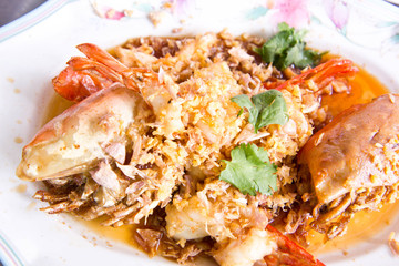 Stir shrimps with garlic on plate ,Thai seafood