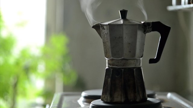 steaming Espresso Machine