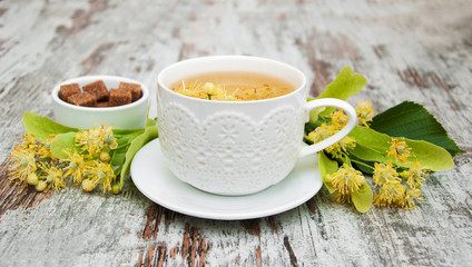 cup of herbal tea with linden flowers