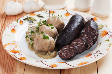 Bread dumplings with blood sausage