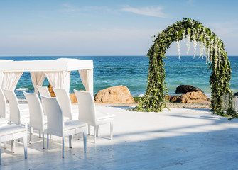 beautiful wedding setting up on beach