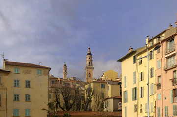 Colorhouse houses and belfry in Menton, France.