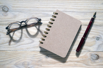 glasses and notebook