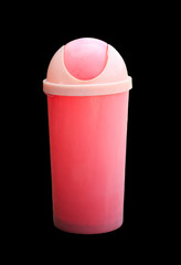 Dirty pink bin isolated on black background