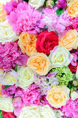 floral arrangement of colorful peonies and roses for event or wedding celebration