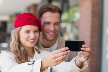A couple taking a selfie