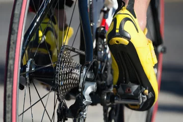 Papier Peint photo Vélo Racing- bike detail on gear wheels and feet
