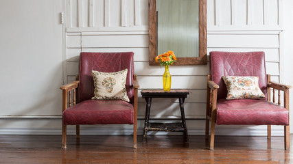 Wooden home with vintage style chairs