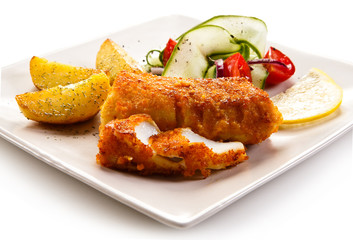 Fish dish - fried fish fillet and vegetables 