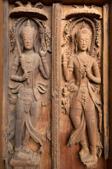 Ancient wooden crafted door panel