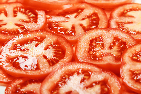 Fresh Natural background with slices of tomato