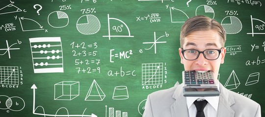 Composite image of geeky smiling businessman biting calculator