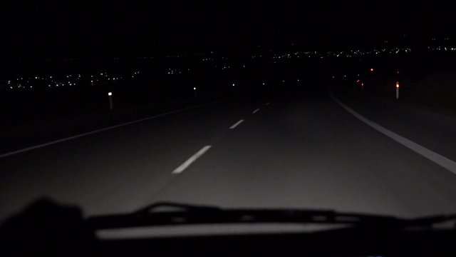 Car driving POV on highway at night. UHD 4K stock footage
