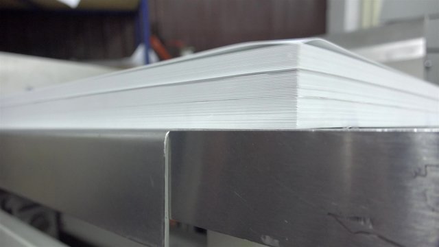 Preparing Large White Papers for Print at the Printing Machine. UHD 4K stock footage