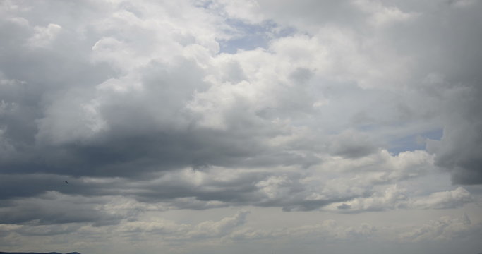 Rain clouds over sea timelapse. UHD 4k stock footage