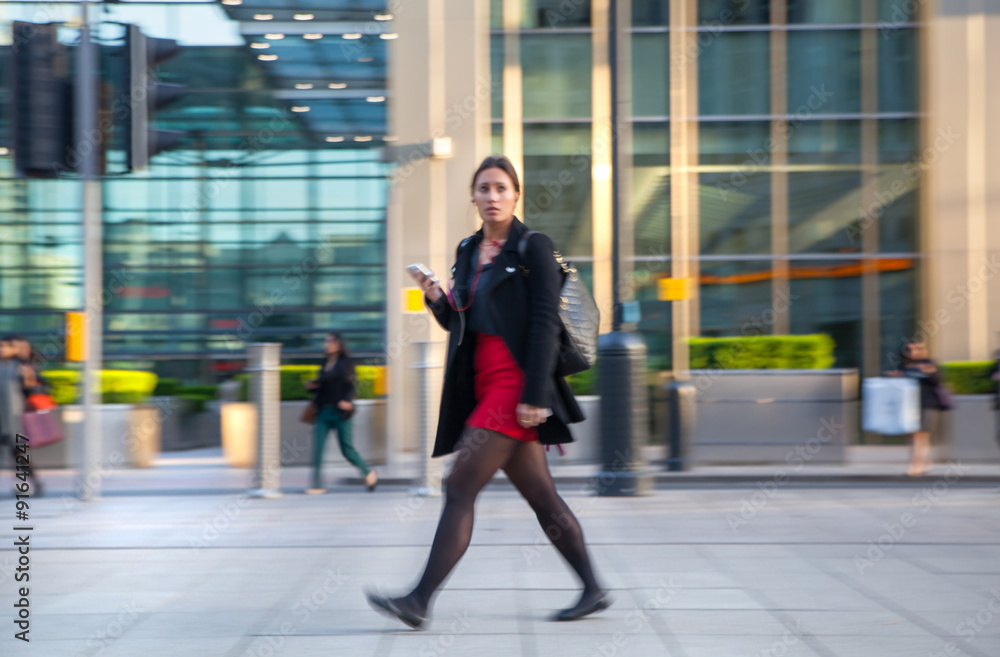 Canvas Prints LONDON, UK - MAY 21, 2015: Canary Wharf business life. Business people going home after working day. Blur