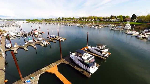 An aerial view of aport, harbor or marina with boats docked.