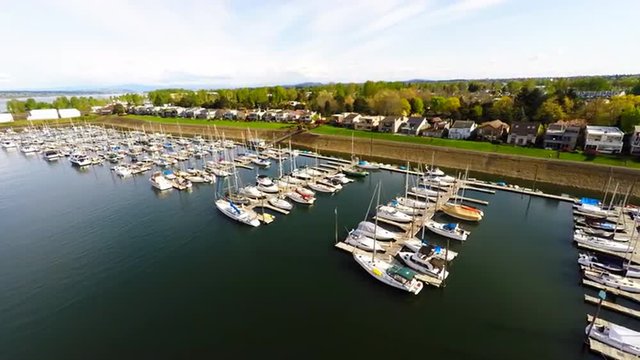 An aerial view of aport, harbor or marina with boats docked.