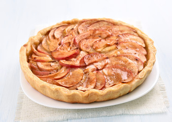 Apple pie on white plate