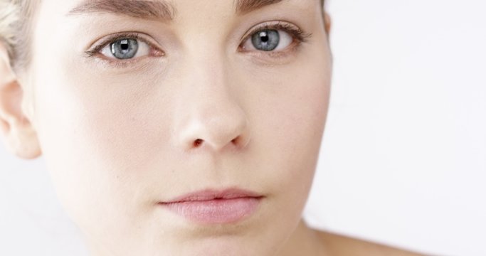 Closeup Beauty portrait of woman face  skincare concept - Red Epic Dragon