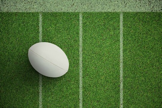Composite image of close-up of rugby ball