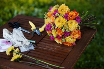 flowers and tools on the table, florist workplace, still life