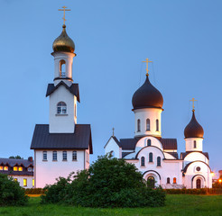 Fototapeta na wymiar Pokrov-Nikolskaya orthodox church in Klaipeda, Lithuania. Was built in 2000, in the public park. Has beautiful view in any season, and located next to city lake.