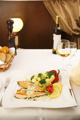 Dinner/A delicious chicken breast in white sauce. Served with steamed vegetables, carrots, cauliflower and potatoes.